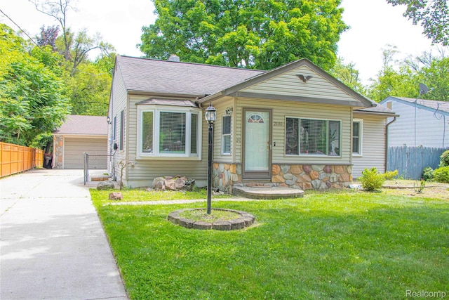 21110 Van Buren St, Southfield, MI 48033 - bungalow-style home with stone siding and roof with shingles