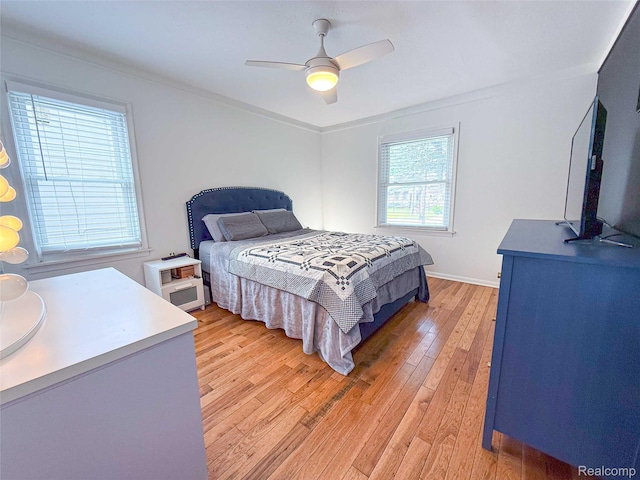 21110 Van Buren St, Southfield, MI 48033 - bedroom with light wood-style floors and a ceiling fan