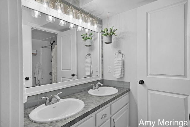 1824 Restoration Dr SW, Byron Center, MI 49315 - bathroom featuring double vanity and a shower