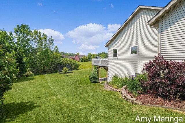 1824 Restoration Dr SW, Byron Center, MI 49315 - view of grassy yard with a deck