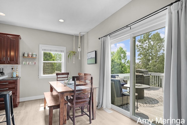 1824 Restoration Dr SW, Byron Center, MI 49315 - dining room featuring light wood finished floors and recessed lighting