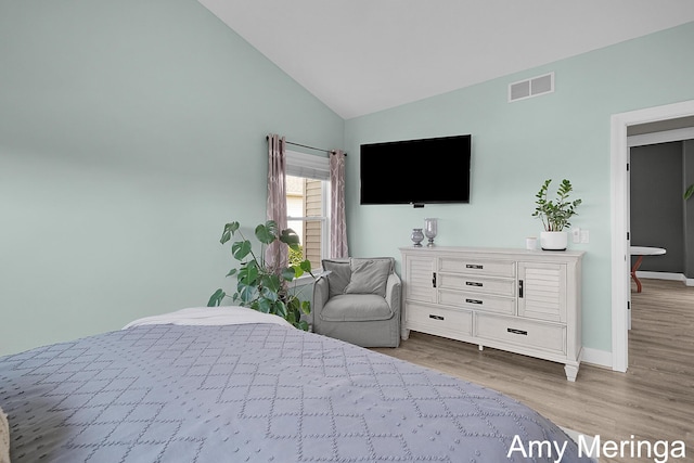 1824 Restoration Dr SW, Byron Center, MI 49315 - bedroom featuring lofted ceiling and light wood-style flooring