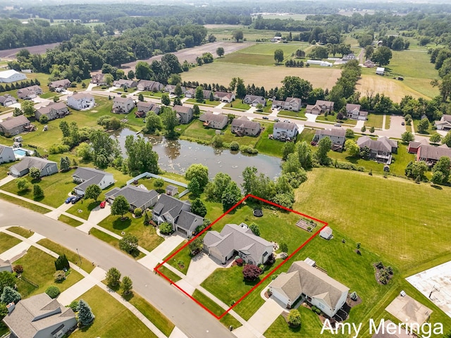 1824 Restoration Dr SW, Byron Center, MI 49315 - aerial perspective of suburban area with a large body of water and property boundaries highlighted