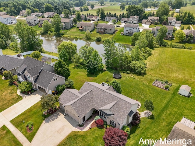 1824 Restoration Dr SW, Byron Center, MI 49315 - aerial view of residential area with a large body of water