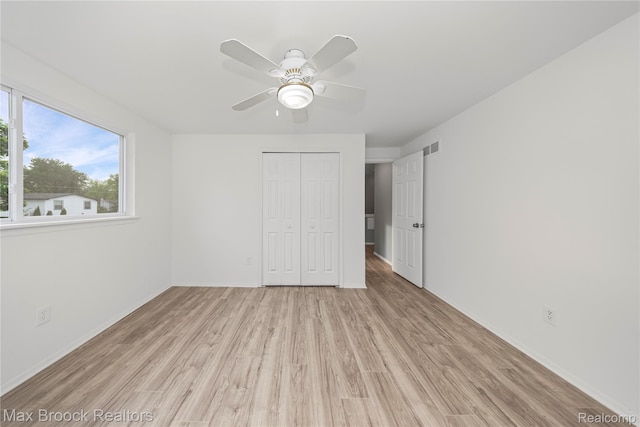 29656 Brentwood St, Southfield, MI 48076 - unfurnished bedroom featuring light wood-style floors, a closet, and a ceiling fan