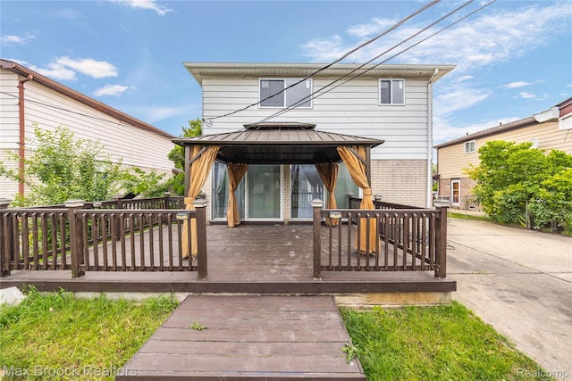 29656 Brentwood St, Southfield, MI 48076 - view of front facade with a gazebo, a wooden deck, and brick siding