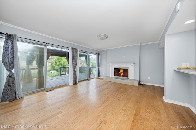 29656 Brentwood St, Southfield, MI 48076 - unfurnished living room with wood finished floors, a fireplace, and ornamental molding