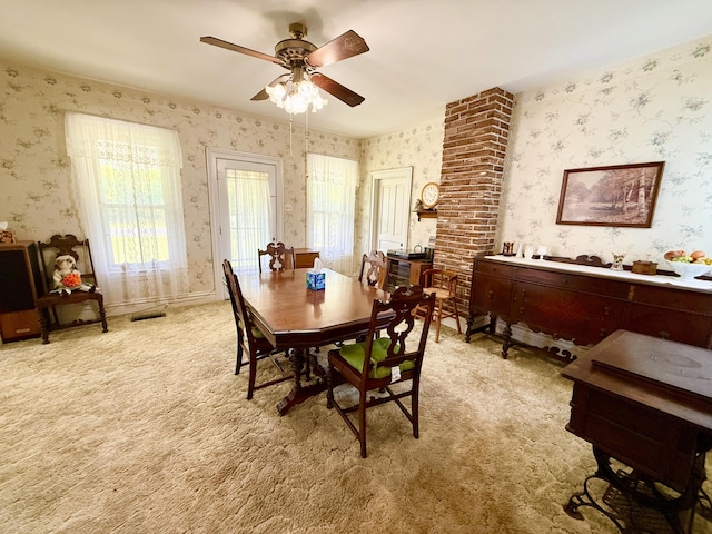 16130 Addison Rd, Addison, MI 49220 - dining space with wallpapered walls, ceiling fan, and light carpet