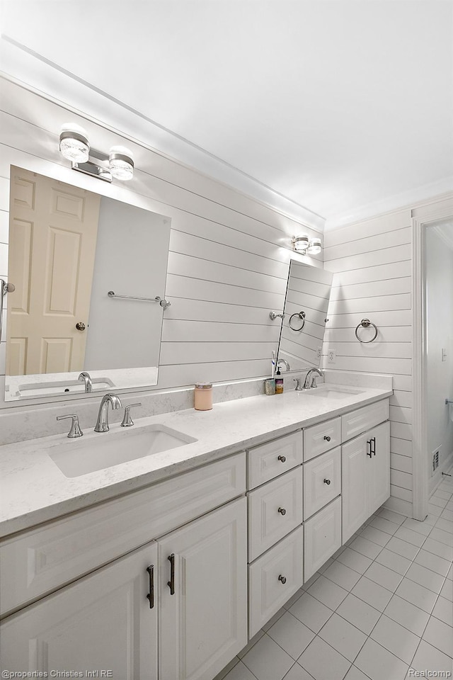 1174 Lakeside Dr, Birmingham, MI 48009 - full bathroom with double vanity and tile patterned flooring