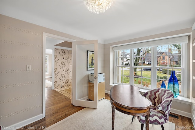 1174 Lakeside Dr, Birmingham, MI 48009 - office area with wood finished floors and a chandelier