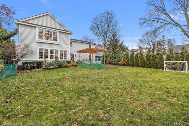 1174 Lakeside Dr, Birmingham, MI 48009 - rear view of house with a pergola