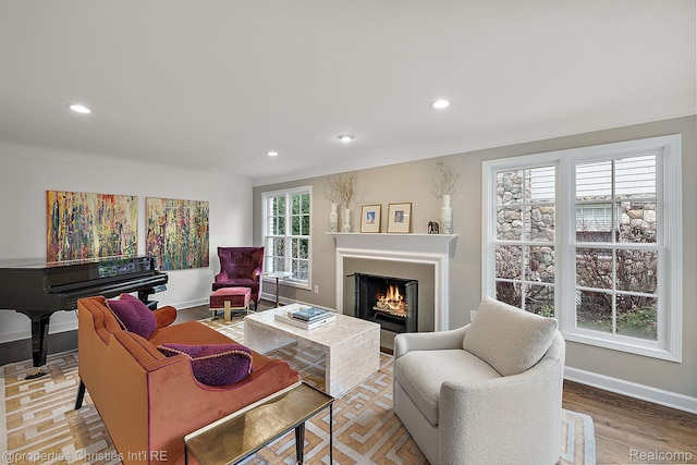 1174 Lakeside Dr, Birmingham, MI 48009 - living room featuring recessed lighting, a glass covered fireplace, and wood finished floors