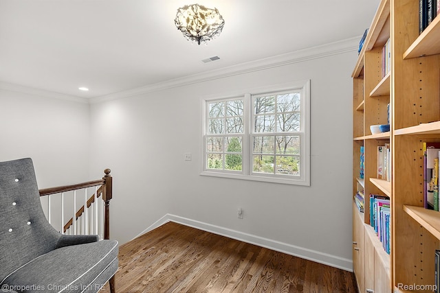 1174 Lakeside Dr, Birmingham, MI 48009 - living area with an upstairs landing, wood finished floors, and crown molding