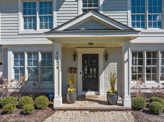 1174 Lakeside Dr, Birmingham, MI 48009 - property entrance with brick siding and a porch