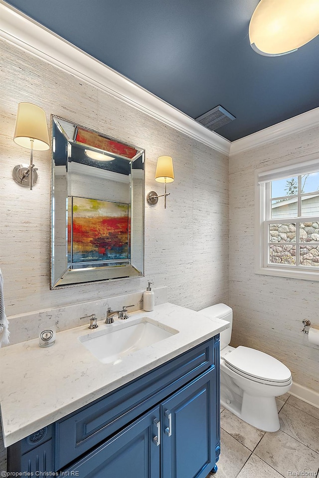 1174 Lakeside Dr, Birmingham, MI 48009 - half bathroom featuring ornamental molding, vanity, and tile patterned floors