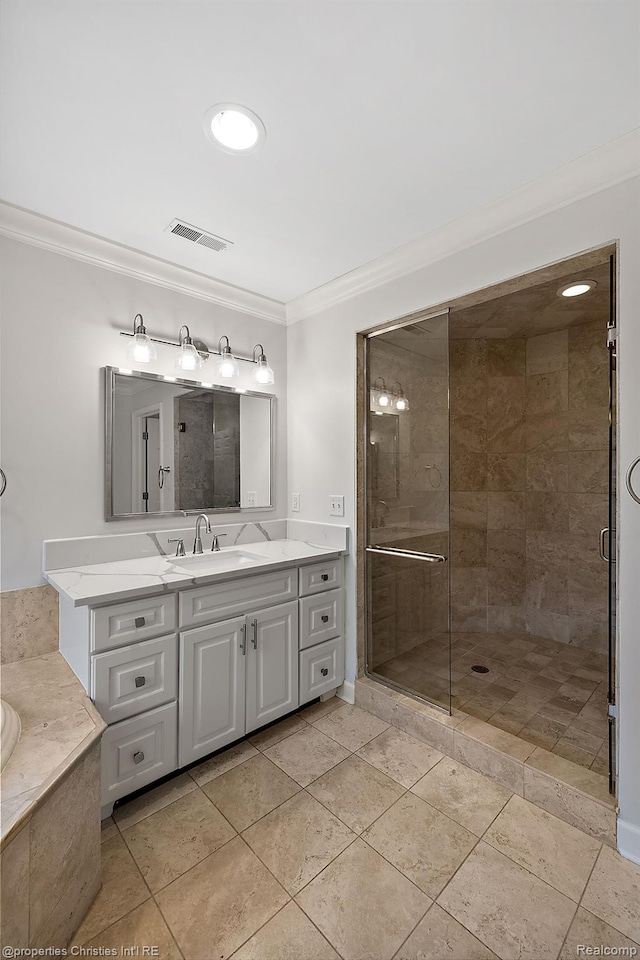 1174 Lakeside Dr, Birmingham, MI 48009 - full bathroom with crown molding, vanity, a garden tub, a shower stall, and tile patterned flooring