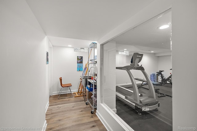 1174 Lakeside Dr, Birmingham, MI 48009 - exercise area with wood finished floors and recessed lighting