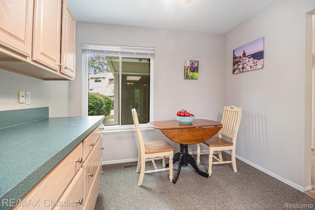 854 Yorktown Ct, Northville, MI 48167 - carpeted dining area featuring baseboards