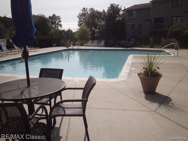854 Yorktown Ct, Northville, MI 48167 - community pool featuring a patio area