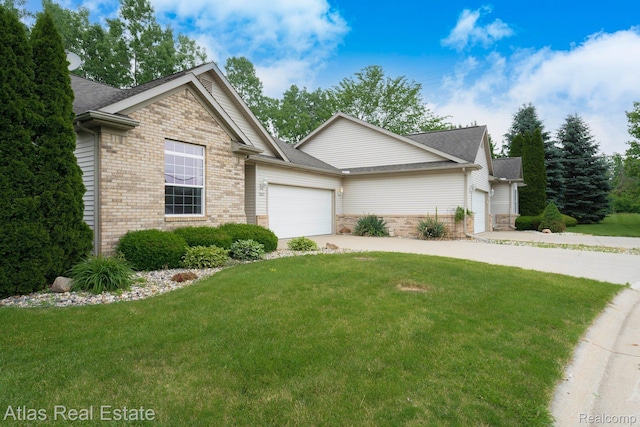 3527 Applewood Ln Unit 2, Grand Blanc, MI 48439 - view of front of property featuring driveway, brick siding, an attached garage, and a front lawn