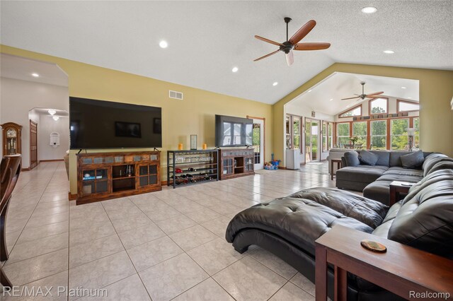 8922 Mcclements Rd, Brighton, MI 48114 - living room with a ceiling fan, light tile patterned flooring, recessed lighting, and high vaulted ceiling
