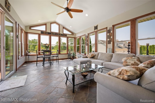 8922 Mcclements Rd, Brighton, MI 48114 - sunroom featuring plenty of natural light, stone tile flooring, vaulted ceiling, and recessed lighting