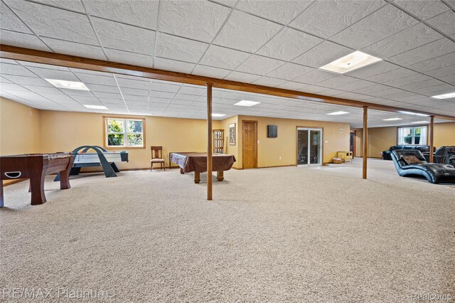 8922 Mcclements Rd, Brighton, MI 48114 - playroom featuring pool table, carpet floors, healthy amount of natural light, and a paneled ceiling