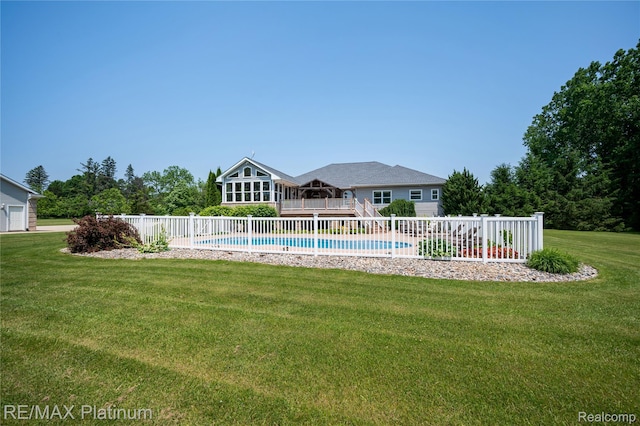 8922 Mcclements Rd, Brighton, MI 48114 - view of pool with a yard and a wooden deck