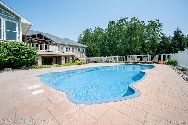 8922 Mcclements Rd, Brighton, MI 48114 - view of swimming pool featuring a fenced backyard, stairs, and a patio
