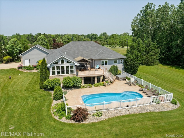 8922 Mcclements Rd, Brighton, MI 48114 - view of swimming pool with a deck, a fenced backyard, and stairs
