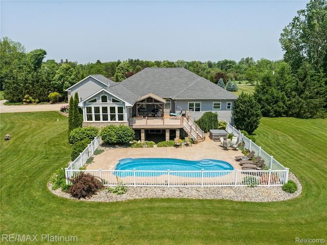 8922 Mcclements Rd, Brighton, MI 48114 - rear view of property featuring a fenced backyard, a shingled roof, stairs, and a wooden deck