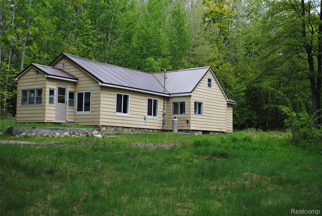 7618 N Athey Ave, Harrison, MI 48625 - photo 1