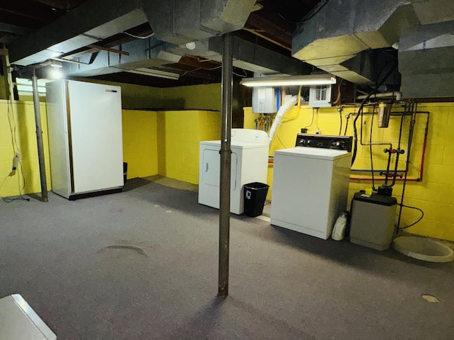 1225 Huntly Rd, Niles, MI 49120 - unfinished below grade area with separate washer and dryer and freestanding refrigerator