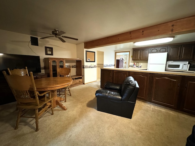 1225 Huntly Rd, Niles, MI 49120 - living area with a ceiling fan, light carpet, and beamed ceiling