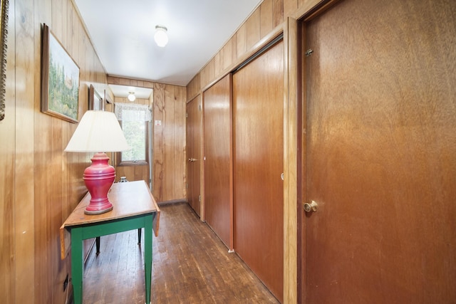 3750 River Rd, Manistee, MI 49660 - hall featuring wood finished floors and wooden walls