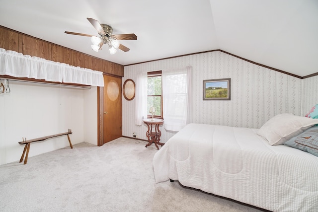 3750 River Rd, Manistee, MI 49660 - bedroom featuring carpet flooring, ceiling fan, lofted ceiling, and wallpapered walls