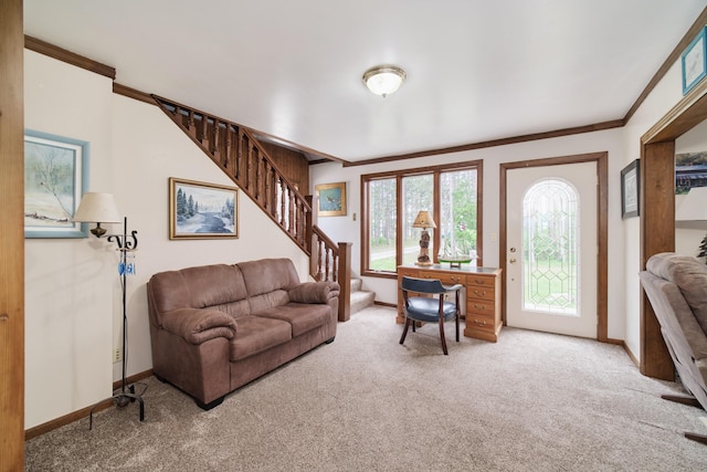 3750 River Rd, Manistee, MI 49660 - carpeted living room with stairs and ornamental molding
