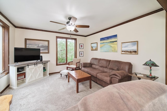 3750 River Rd, Manistee, MI 49660 - carpeted living room with ceiling fan and crown molding