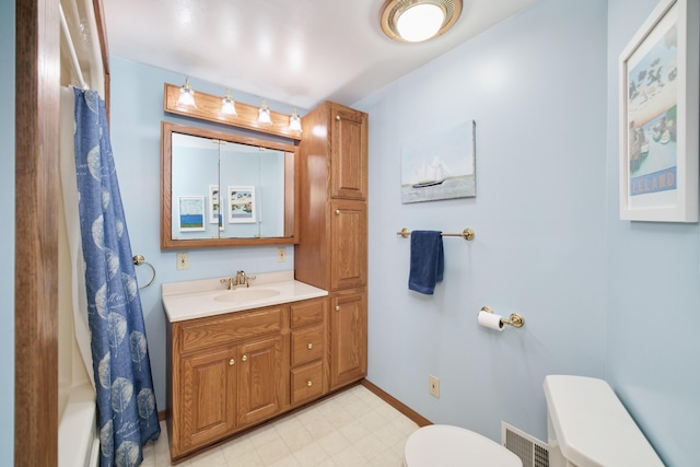 3750 River Rd, Manistee, MI 49660 - full bathroom with vanity and tile patterned floors