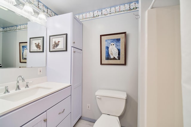 3750 River Rd, Manistee, MI 49660 - bathroom featuring vanity and toilet