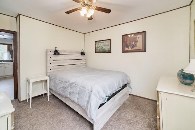 3750 River Rd, Manistee, MI 49660 - bedroom featuring light carpet and a ceiling fan