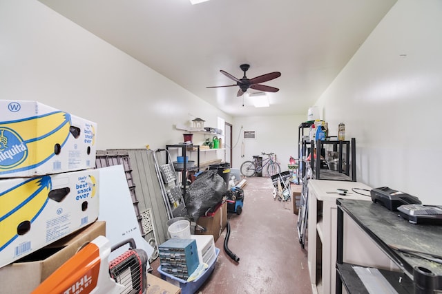 3750 River Rd, Manistee, MI 49660 - miscellaneous room featuring concrete floors and a ceiling fan