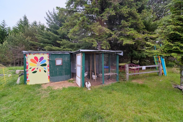 3750 River Rd, Manistee, MI 49660 - view of poultry coop featuring a lawn