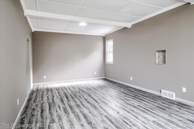 1372 S Packard Ave, Burton, MI 48509 - empty room with wood finished floors and baseboards