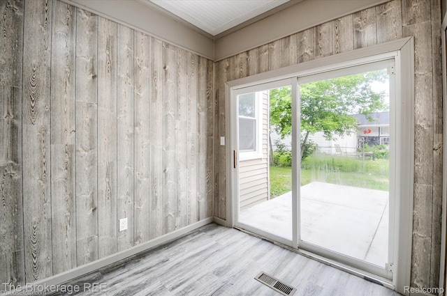 1372 S Packard Ave, Burton, MI 48509 - entryway featuring wood finished floors and baseboards