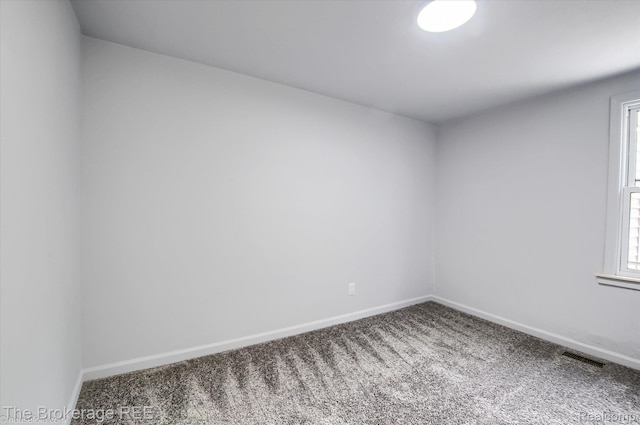 1372 S Packard Ave, Burton, MI 48509 - unfurnished room with carpet floors and baseboards