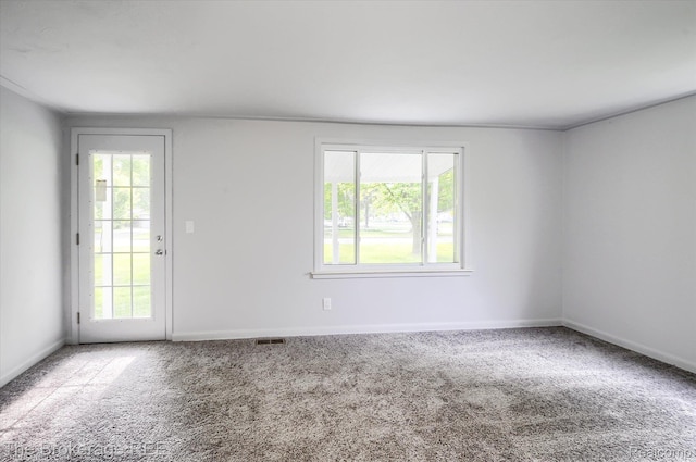 1372 S Packard Ave, Burton, MI 48509 - spare room with carpet floors