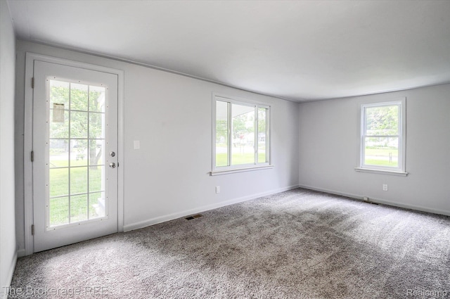1372 S Packard Ave, Burton, MI 48509 - unfurnished room featuring carpet flooring and baseboards