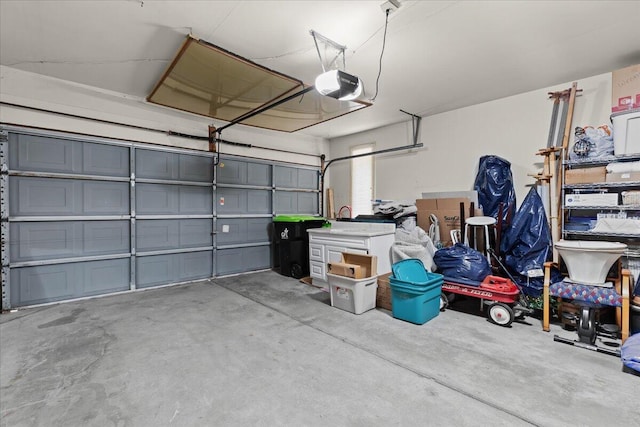 21112 Boulder Cir, Northville, MI 48167 - garage featuring a garage door opener