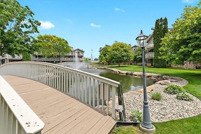 21112 Boulder Cir, Northville, MI 48167 - dock with a lawn and a water view